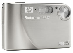 Máquina digital HP Photosmart R727 - Diagonal - Cortesia da Canon, editada pelo Câmera versus Câmera