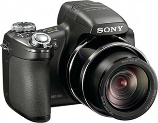 Câmera digital Sony Cyber-shot DSC-HX1 - Diagonal - Cortesia da Sony, editada pelo Câmera versus Câmera