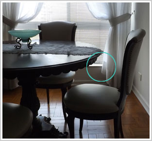 Sala de jantar contra luz, círculo verde marca área crítica para o teste de distorção cromática