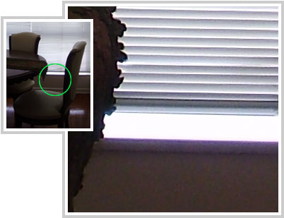 Sala de jantar contra luz e recorte na visualização 100%: produção de purple fringing pela lente da Olympus FE-330